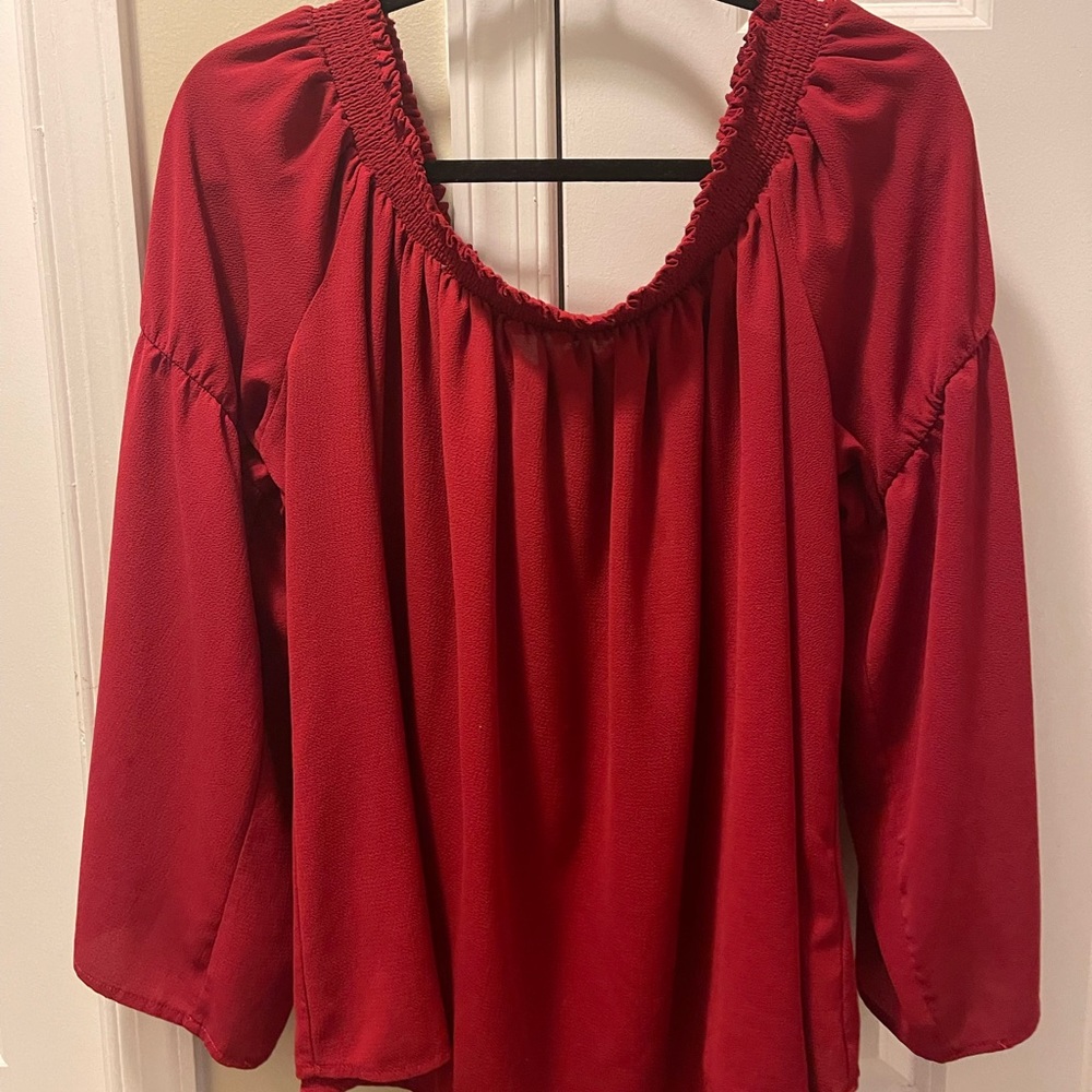 Red off-the-shoulder shirt